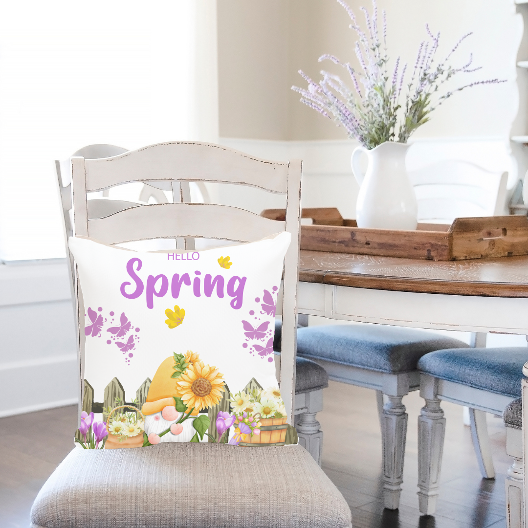 Hello spring pillow cover on a pillow displayed on a dining chair